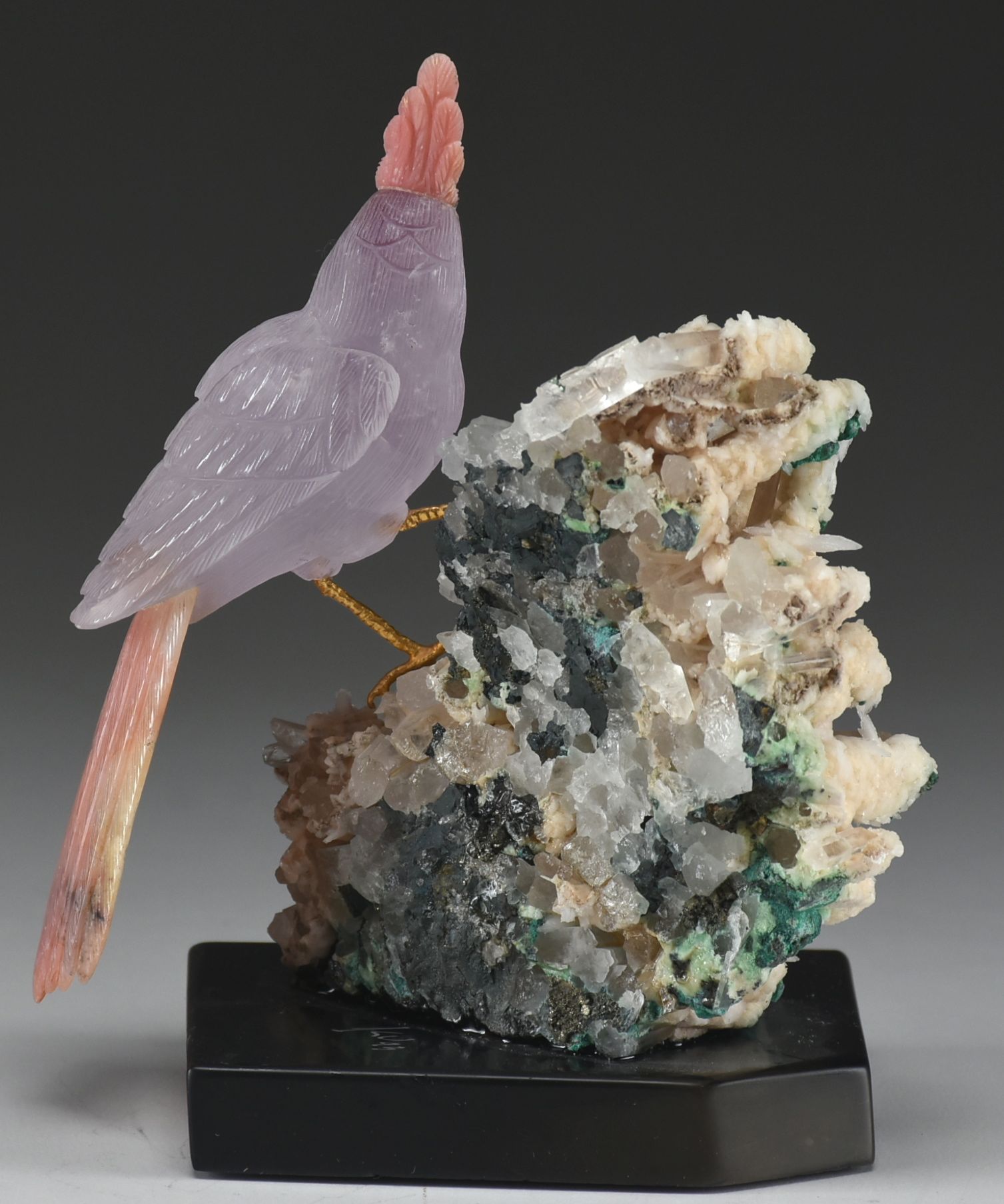 Carved Stone Bird Sculpture on Mineral Base