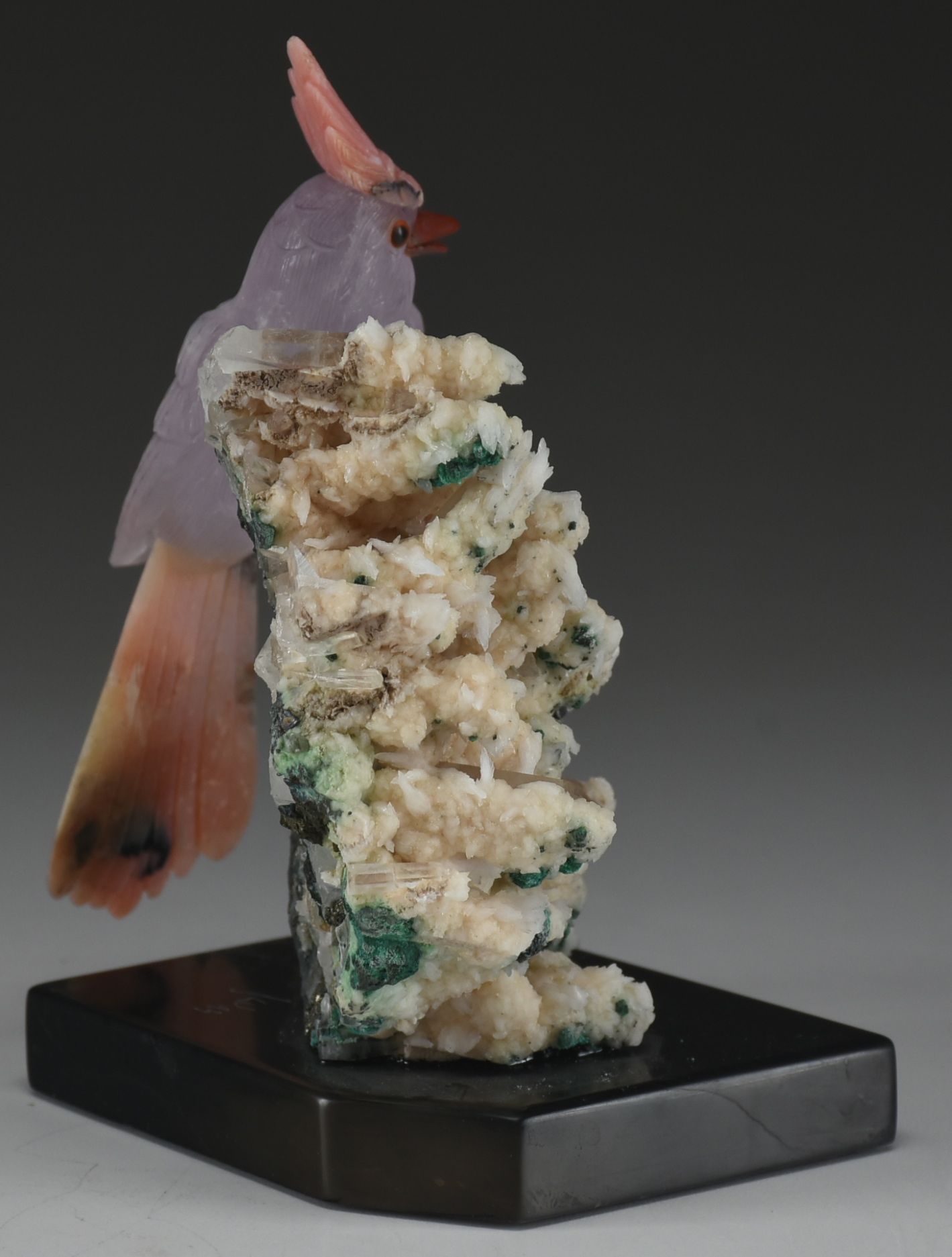 Carved Stone Bird Sculpture on Mineral Base