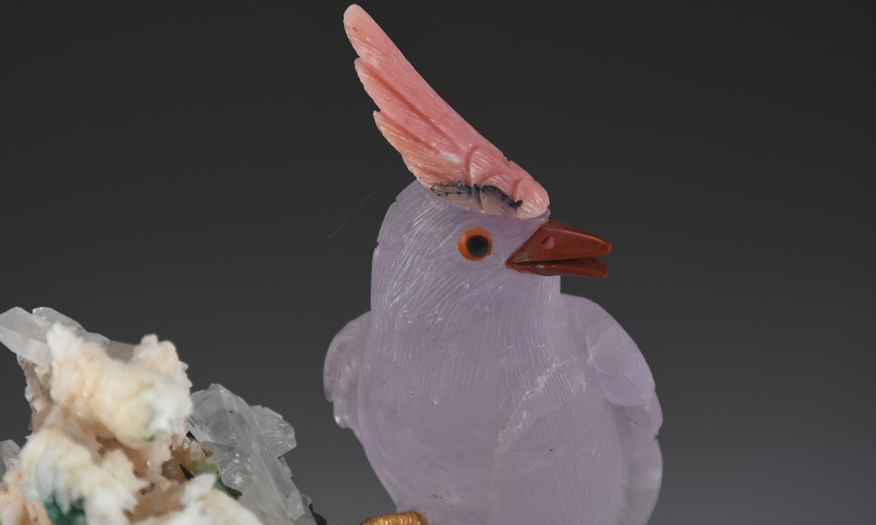 Carved Stone Bird Sculpture on Mineral Base