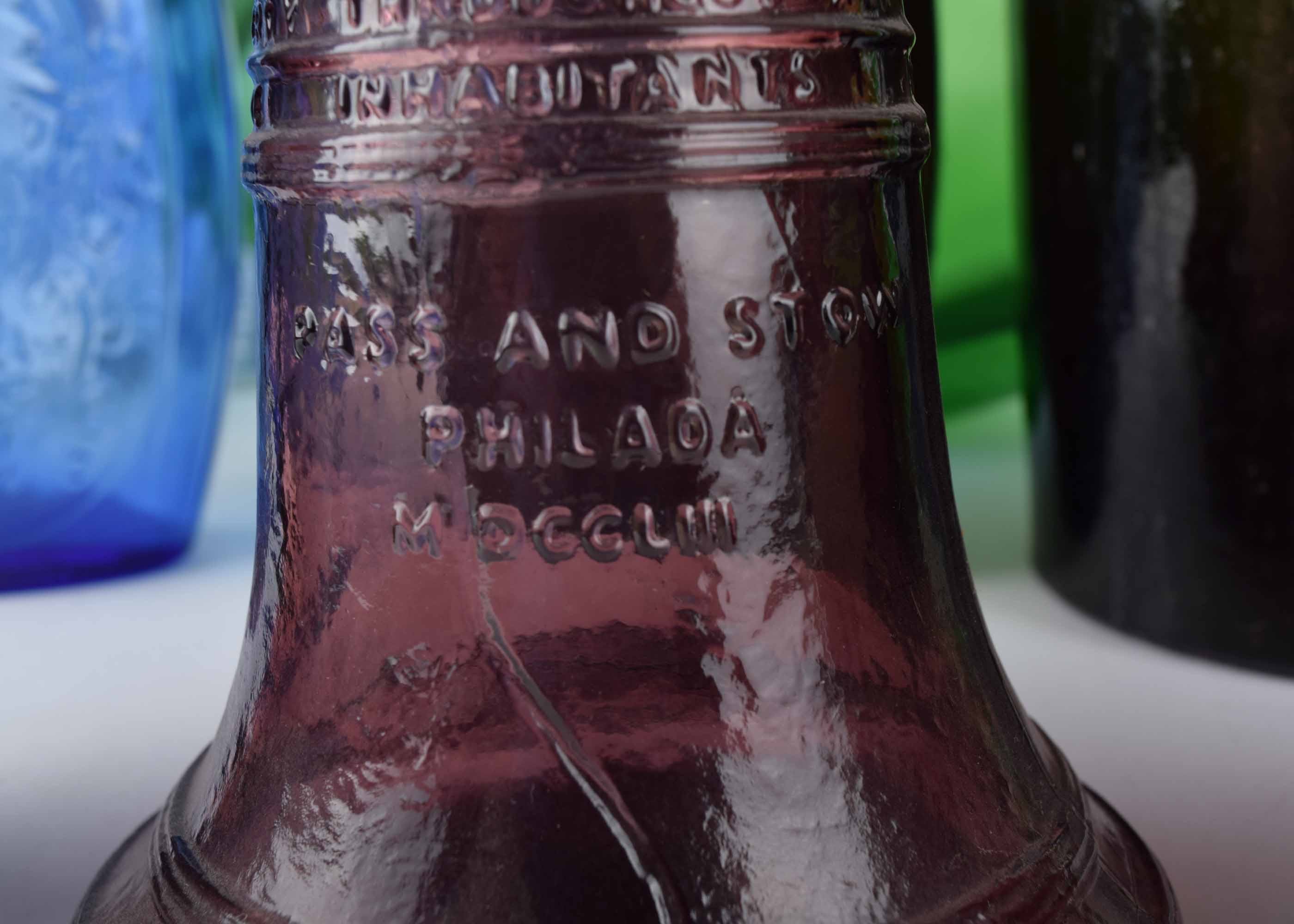 Colored Glass Bottle and Vase Collection