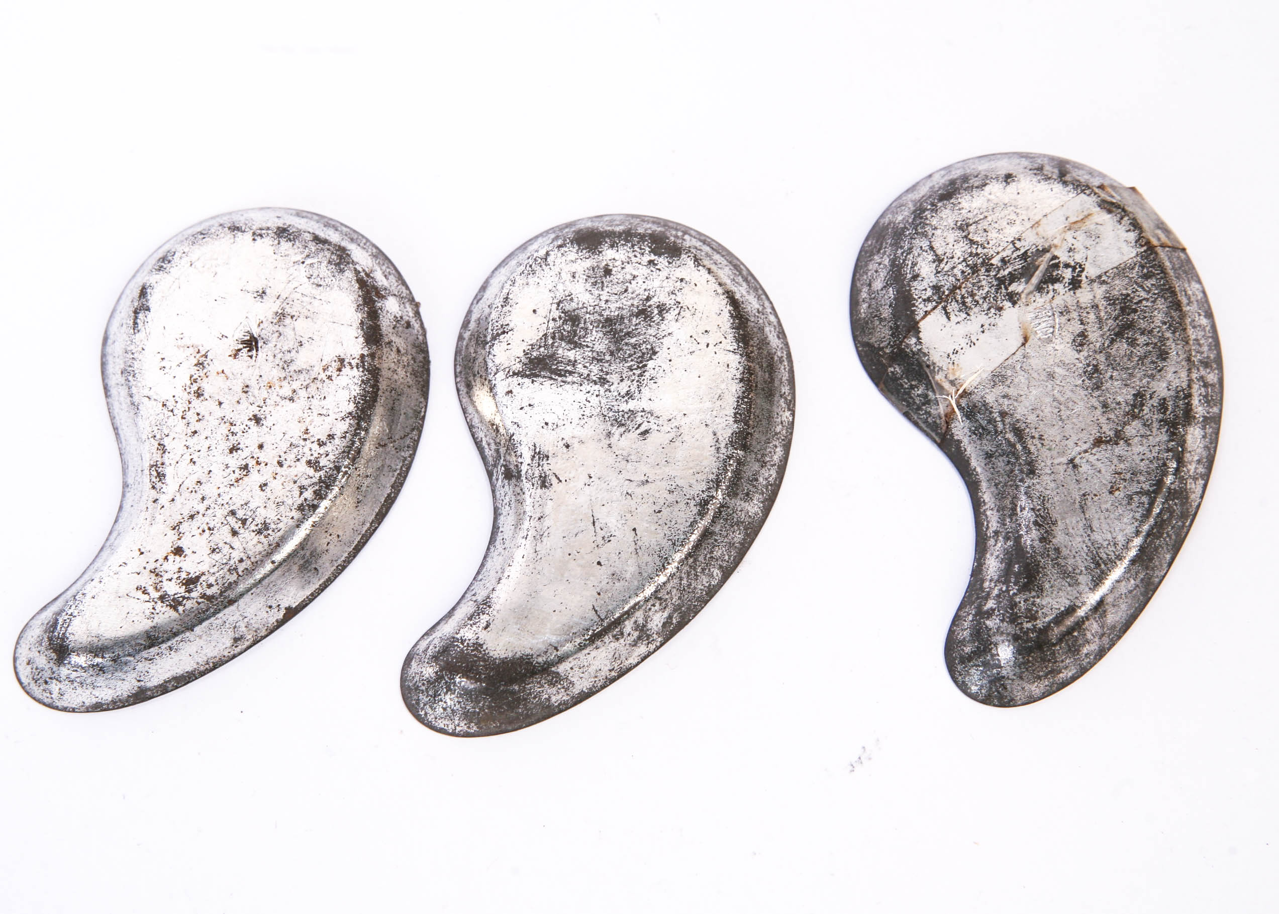 Group of Small Vintage Metal Tins and a Lighbulb