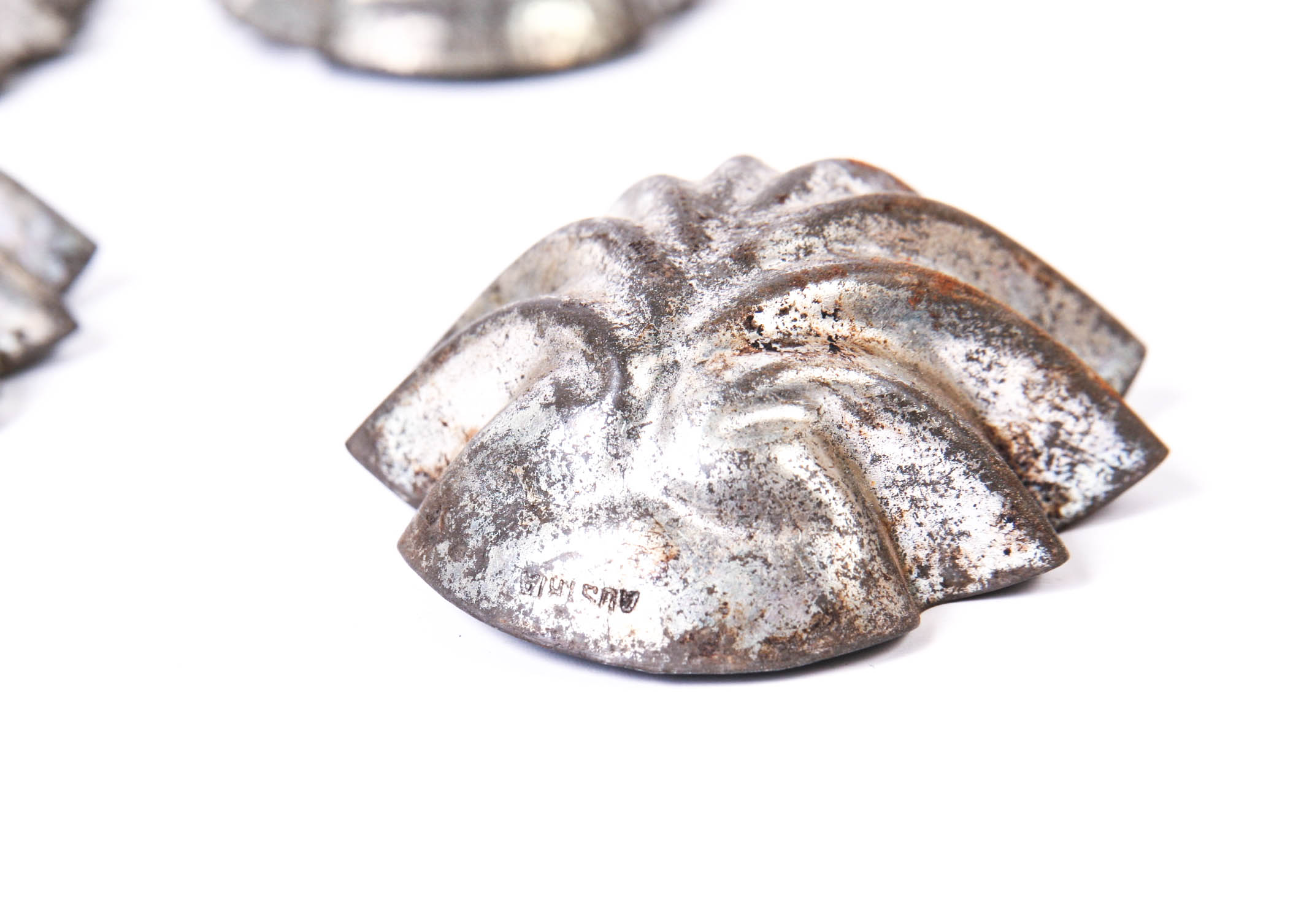 Group of Small Vintage Metal Tins and a Lighbulb