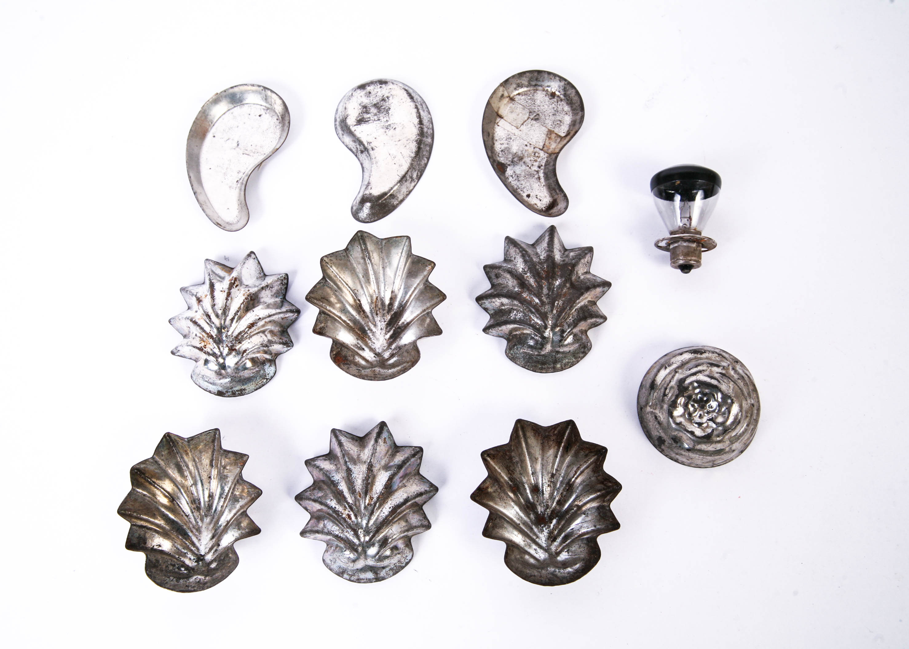 Group of Small Vintage Metal Tins and a Lighbulb