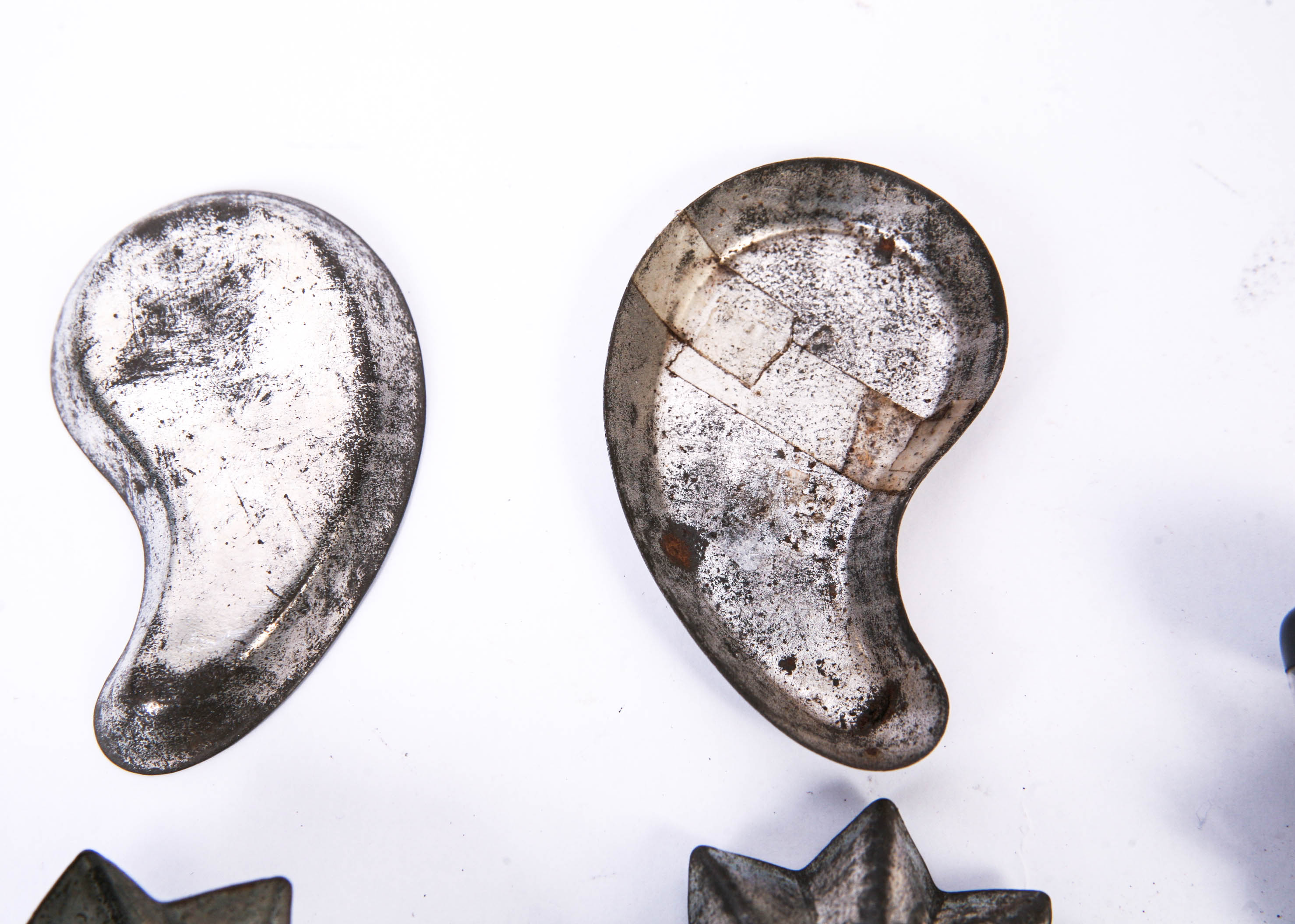 Group of Small Vintage Metal Tins and a Lighbulb