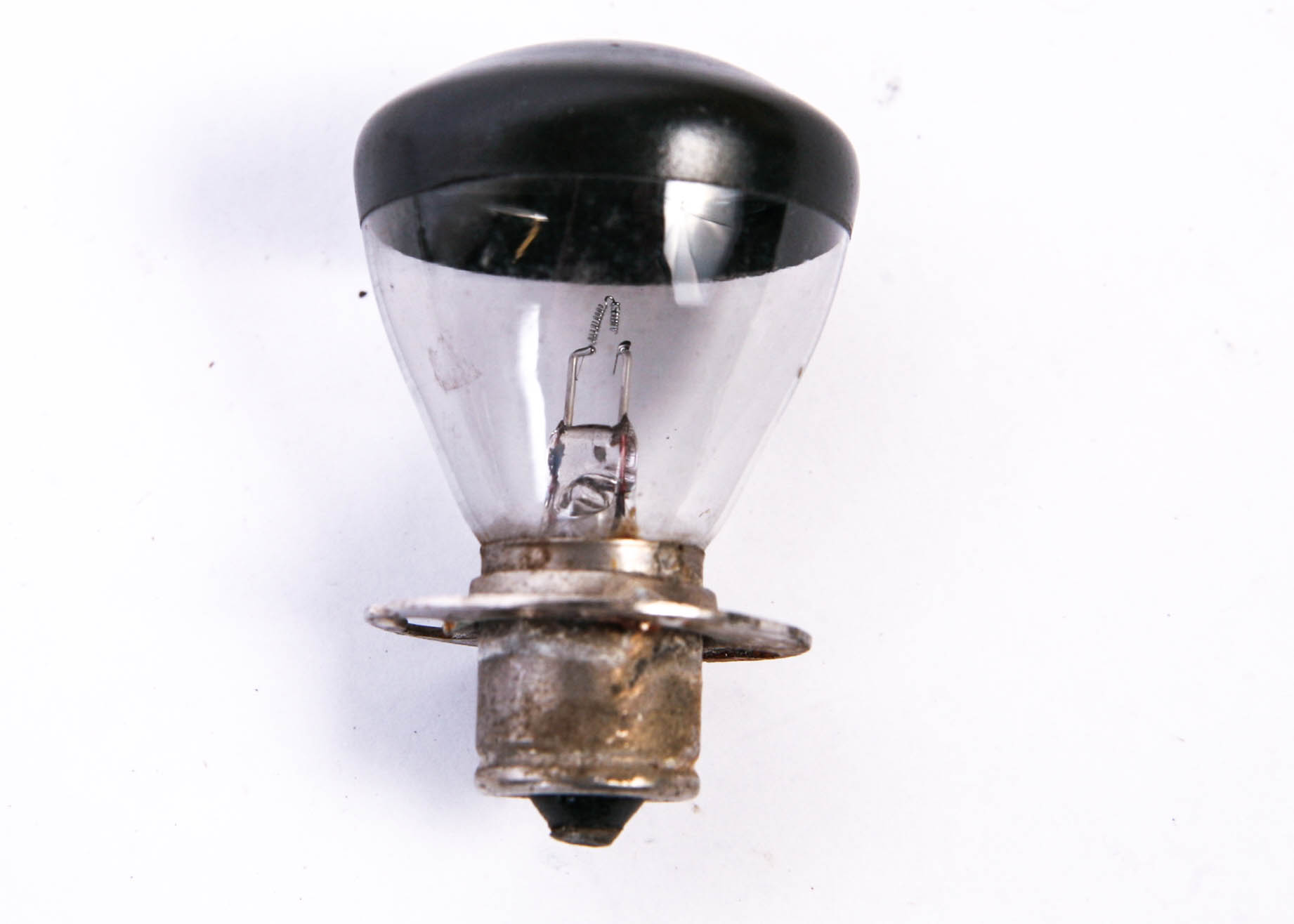 Group of Small Vintage Metal Tins and a Lighbulb