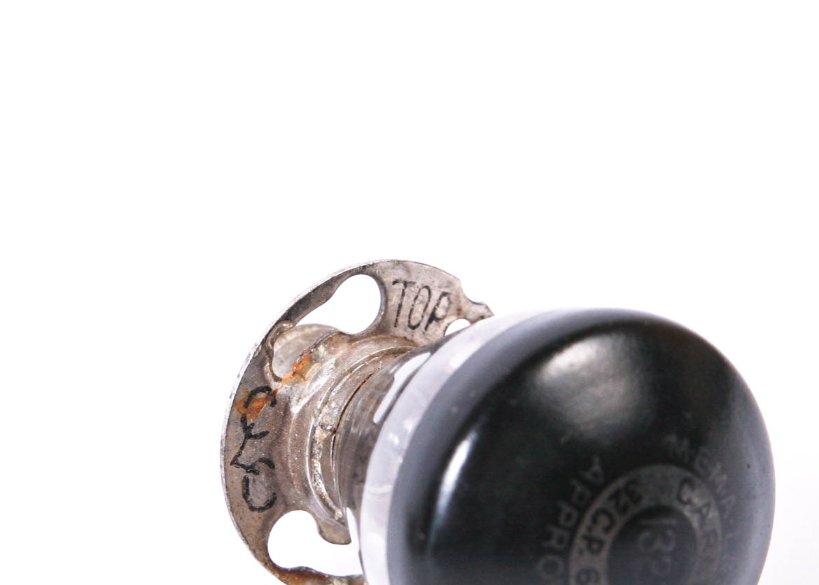 Group of Small Vintage Metal Tins and a Lighbulb