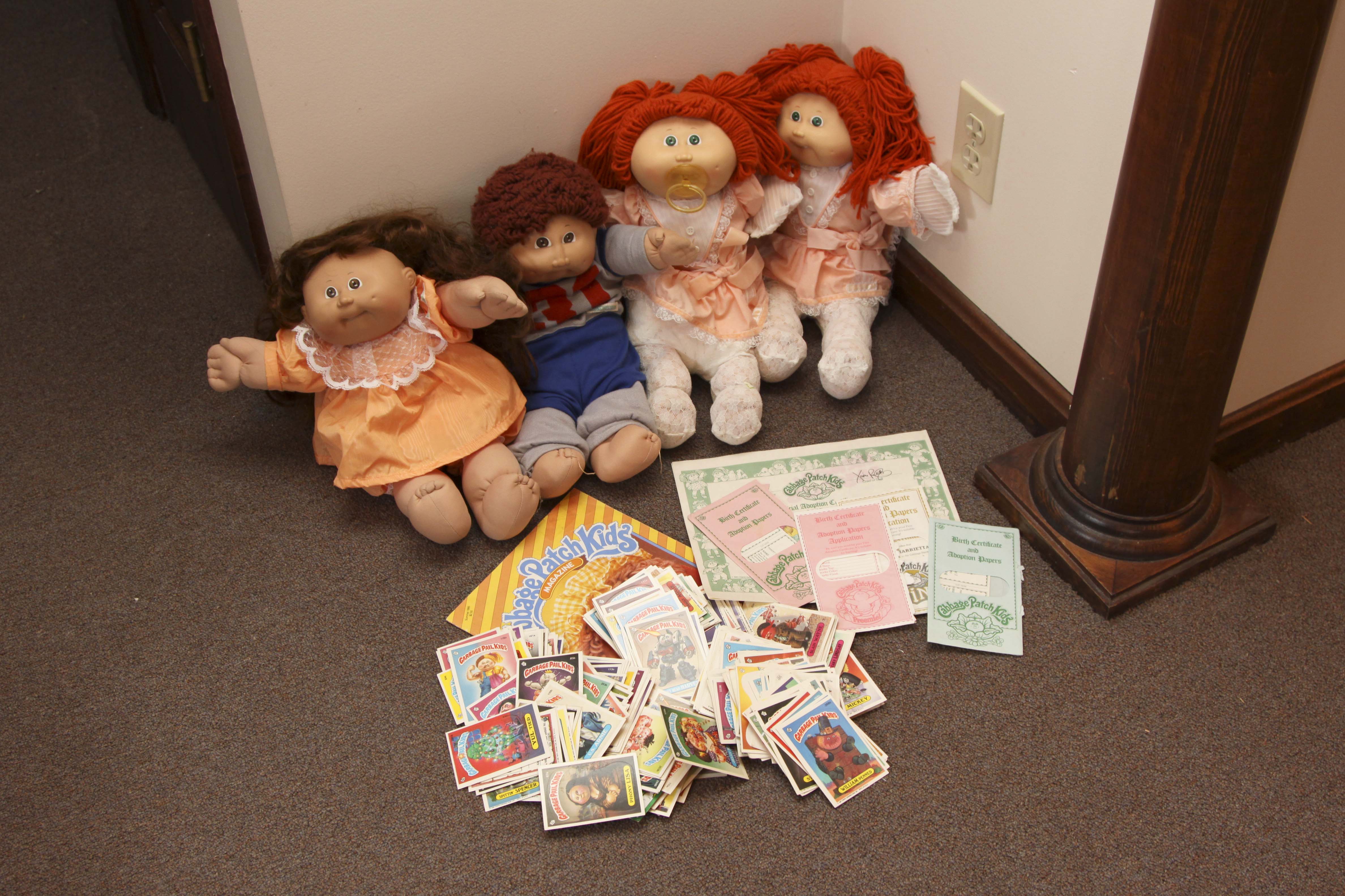 Four Cabbage Patch Dolls and Garbage Pail Kids Trading Cards