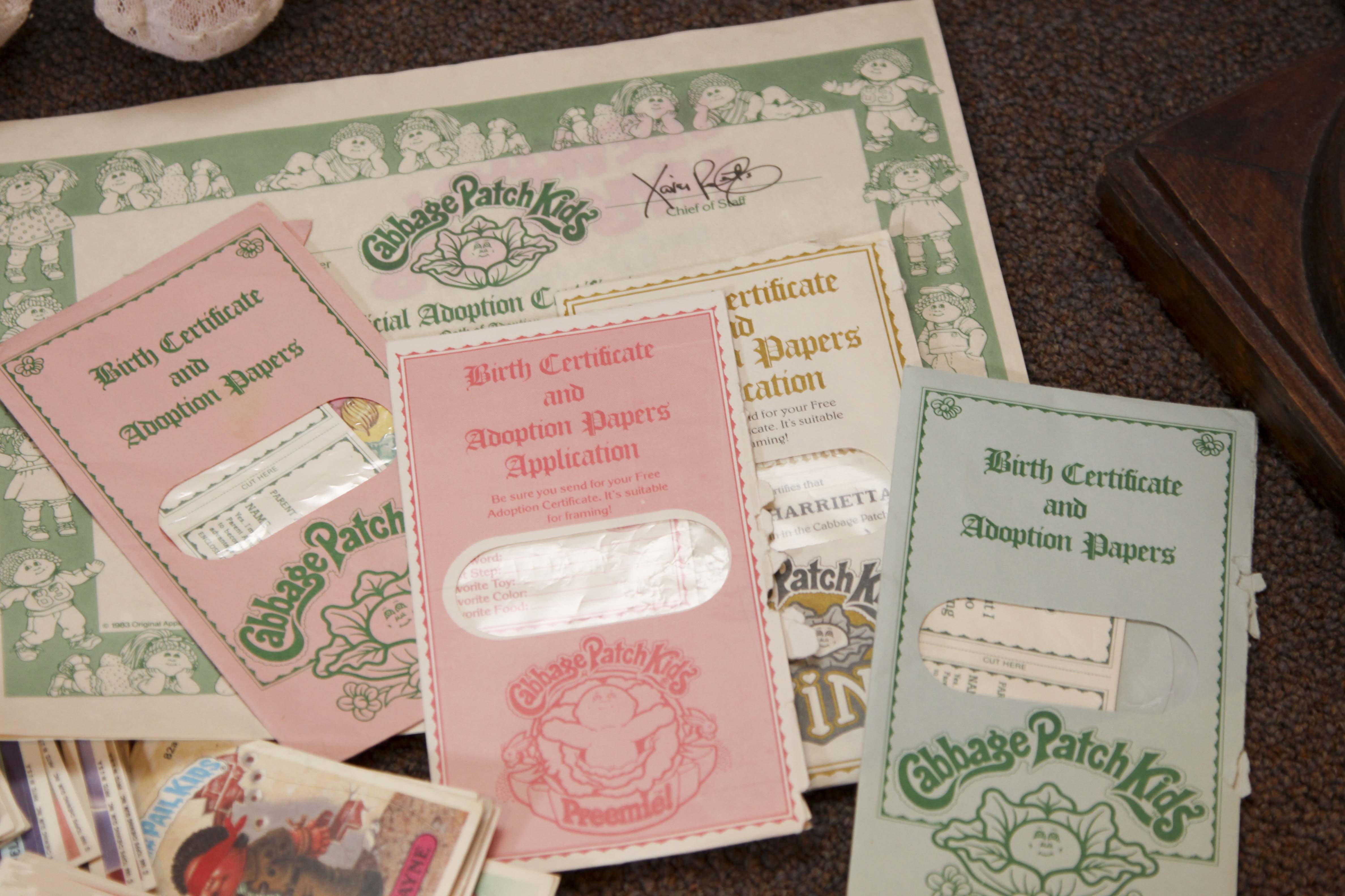 Four Cabbage Patch Dolls and Garbage Pail Kids Trading Cards