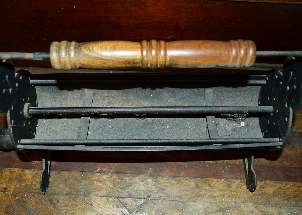 Black Metal Newspaper Log Roller