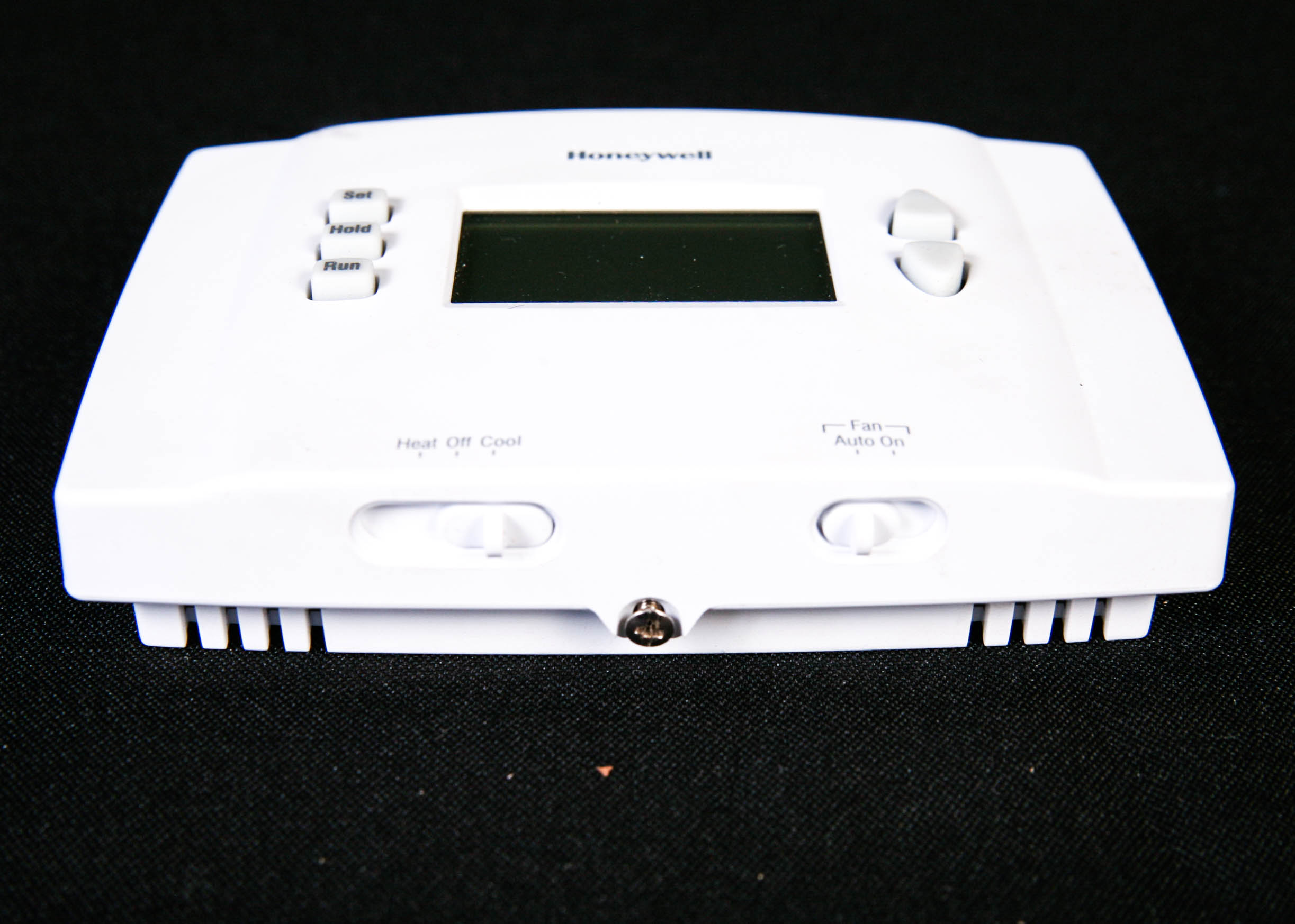 Honeywell RTH2410 5-1-1 Programmable Thermostat with Operating Manual