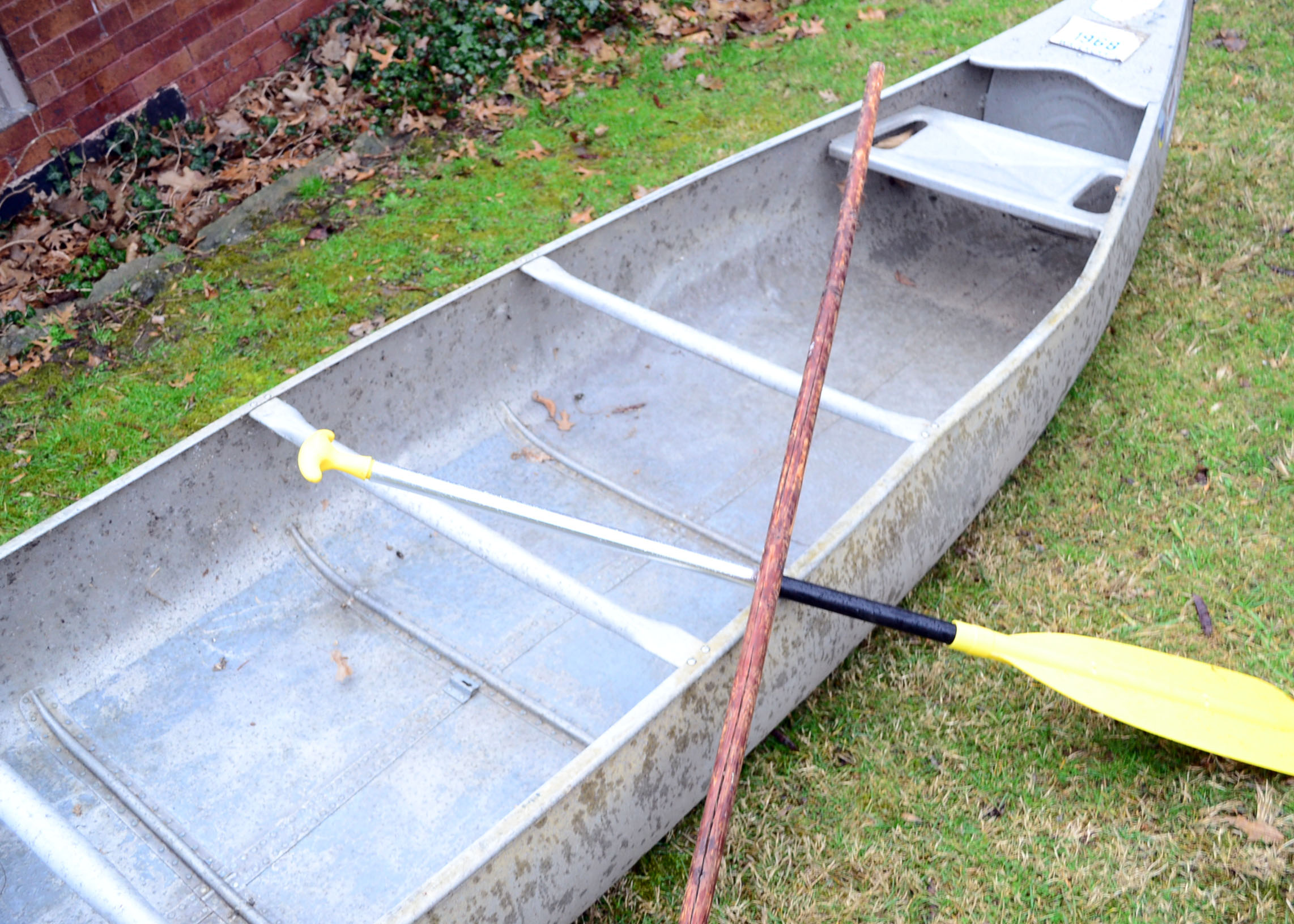 Grumman Aluminum Canoe With Oar and Pizza Paddle
