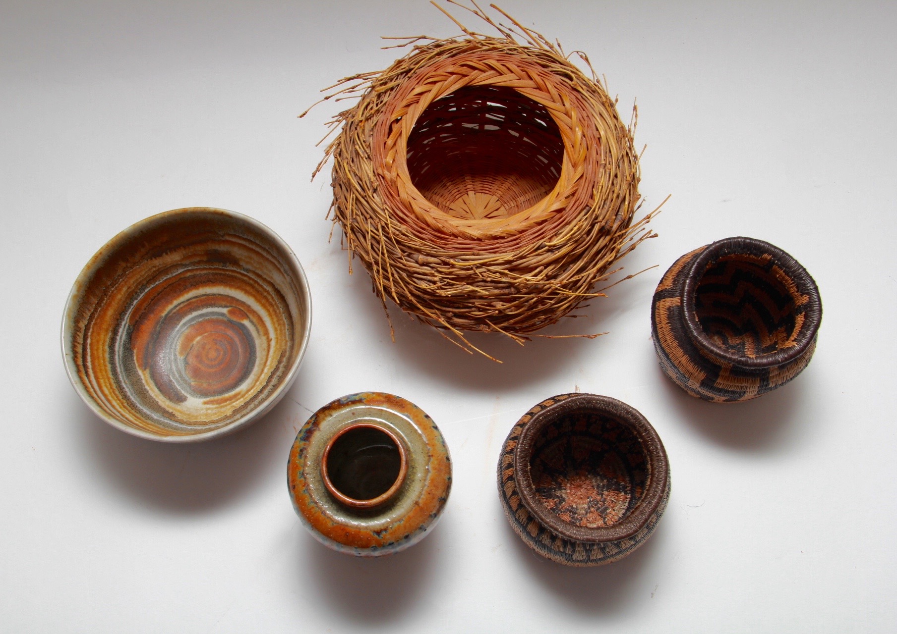 Assortment of Baskets and Pottery