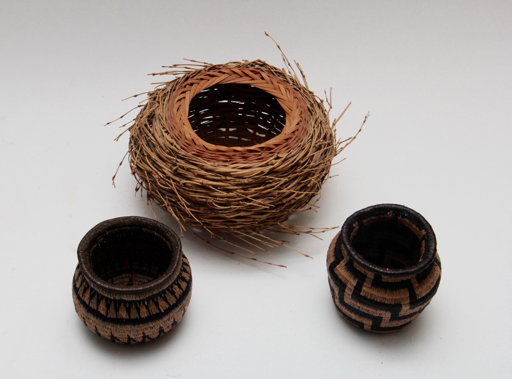 Assortment of Baskets and Pottery