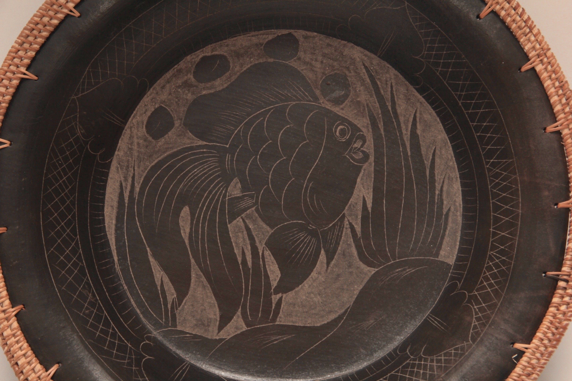 Pottery Bowl with Fish Design and Wicker Edge