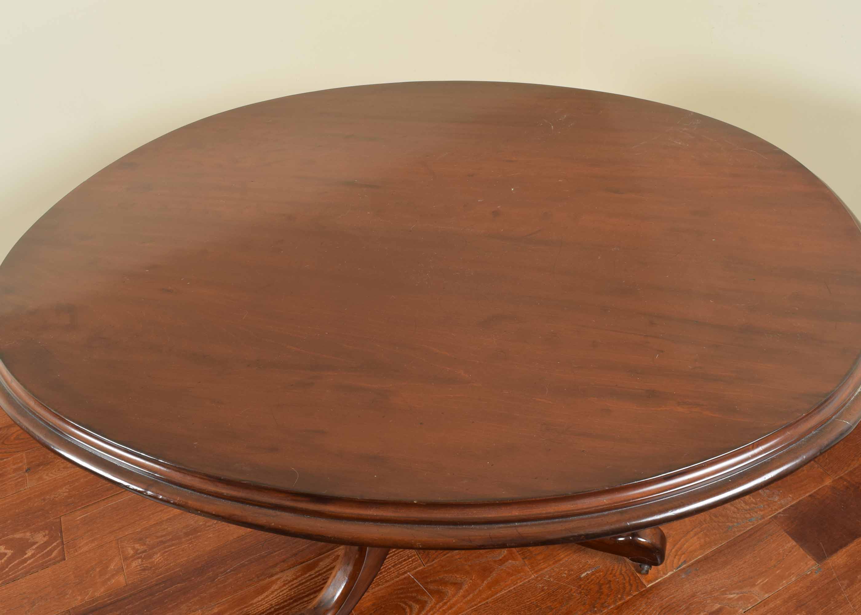 Oval Pedestal Dining Table