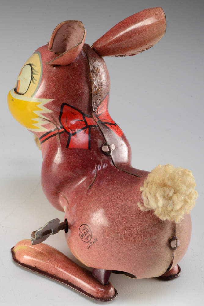 Collection of Vintage Wind-Up Toys and Music Boxes