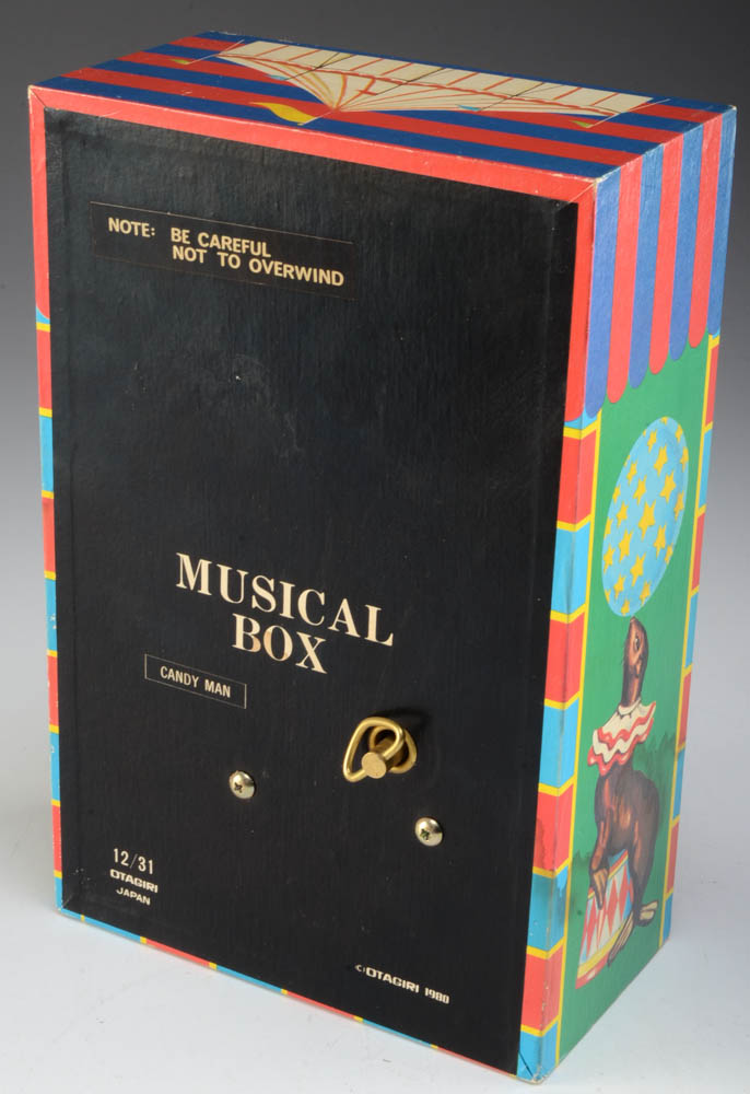 Collection of Vintage Wind-Up Toys and Music Boxes