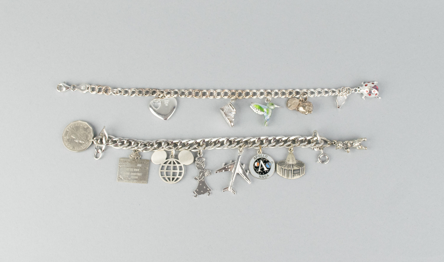 Two Vintage Sterling Silver Charm Bracelets