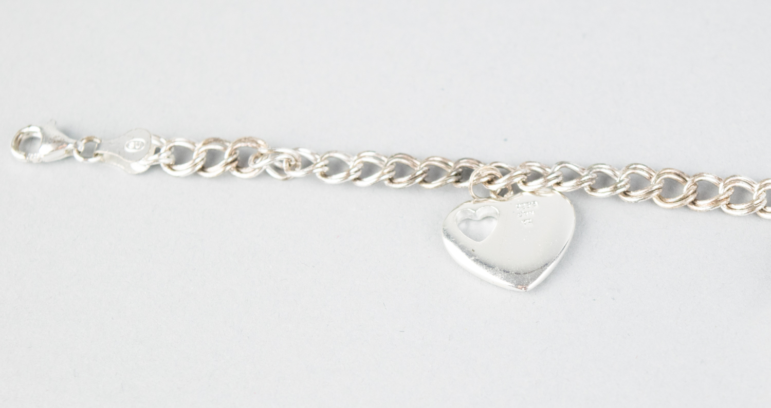 Two Vintage Sterling Silver Charm Bracelets