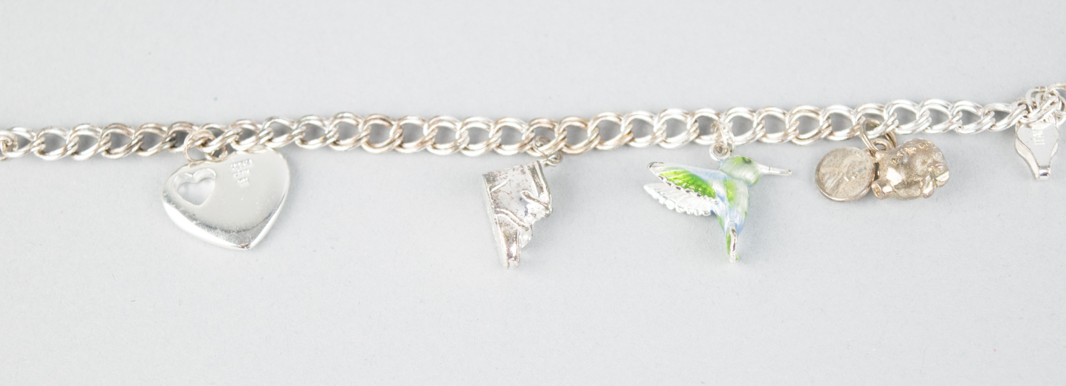 Two Vintage Sterling Silver Charm Bracelets