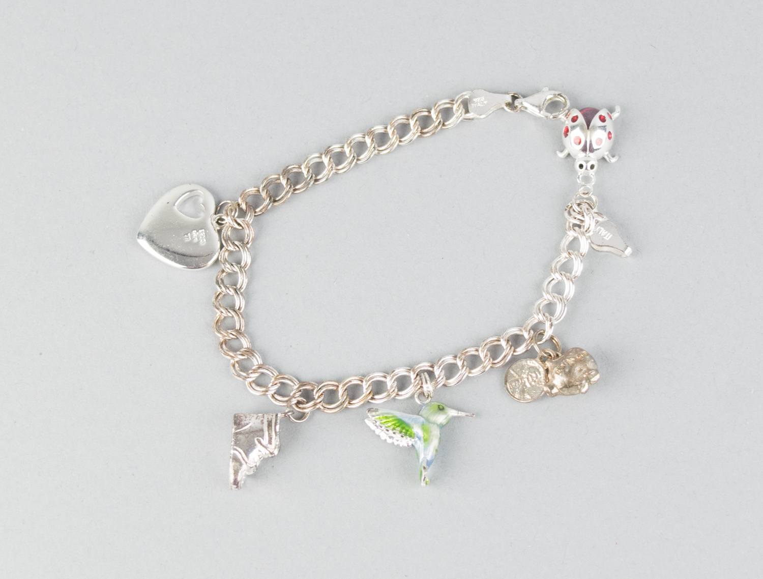 Two Vintage Sterling Silver Charm Bracelets