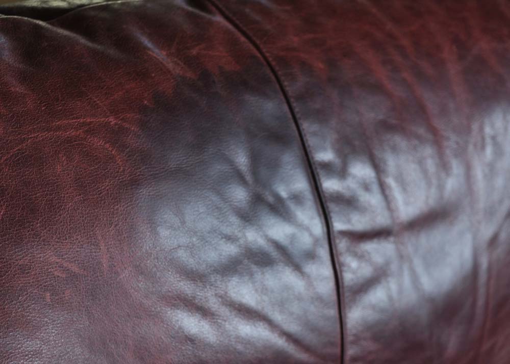 Morgan Stewart Burgundy Leather Saloon Chair with Ottoman