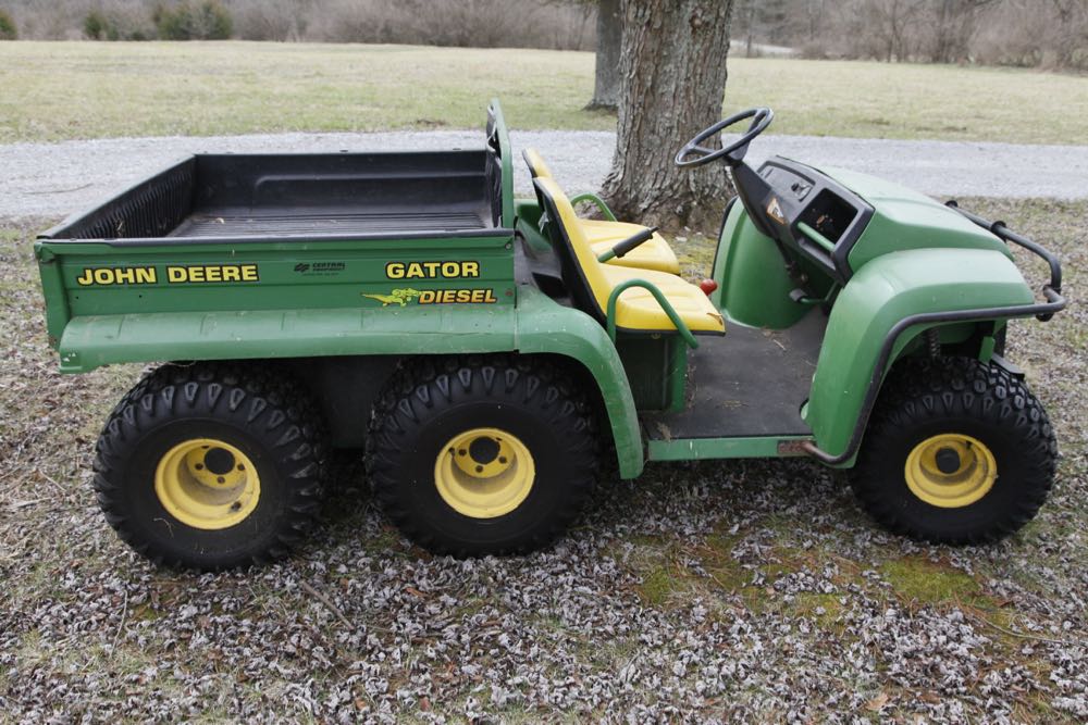 John Deere Gator and Large Lawn Sweeper