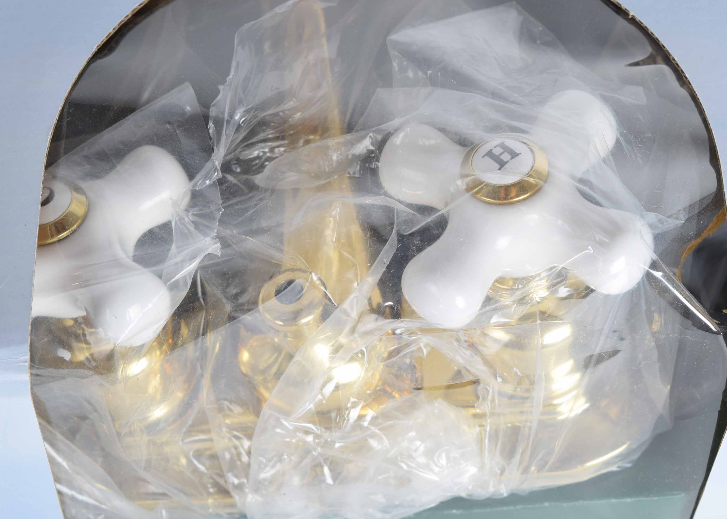 Kingston Brass & Porcelain Knob Faucet