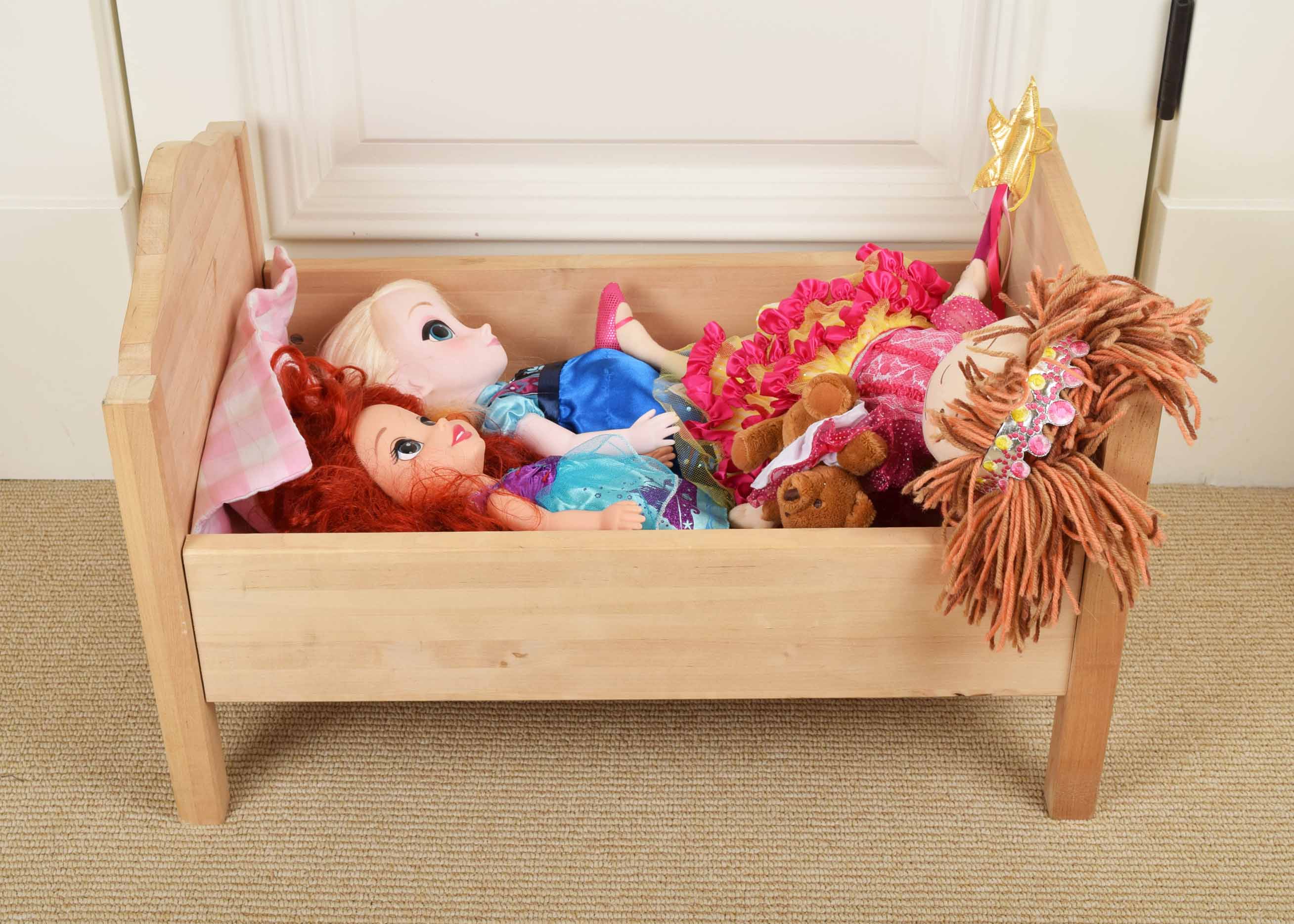 Wooden Doll Bed and Three Dolls