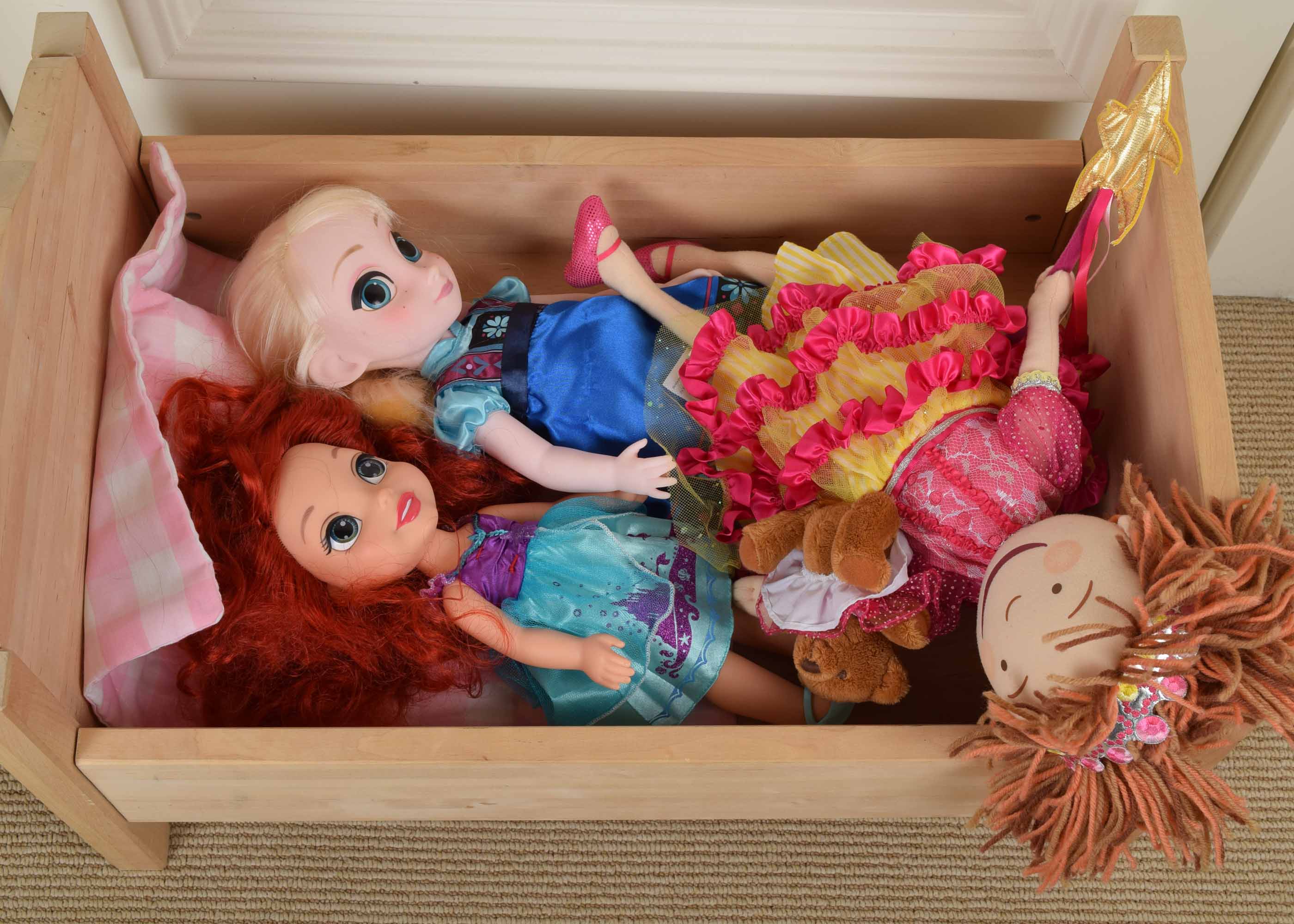 Wooden Doll Bed and Three Dolls