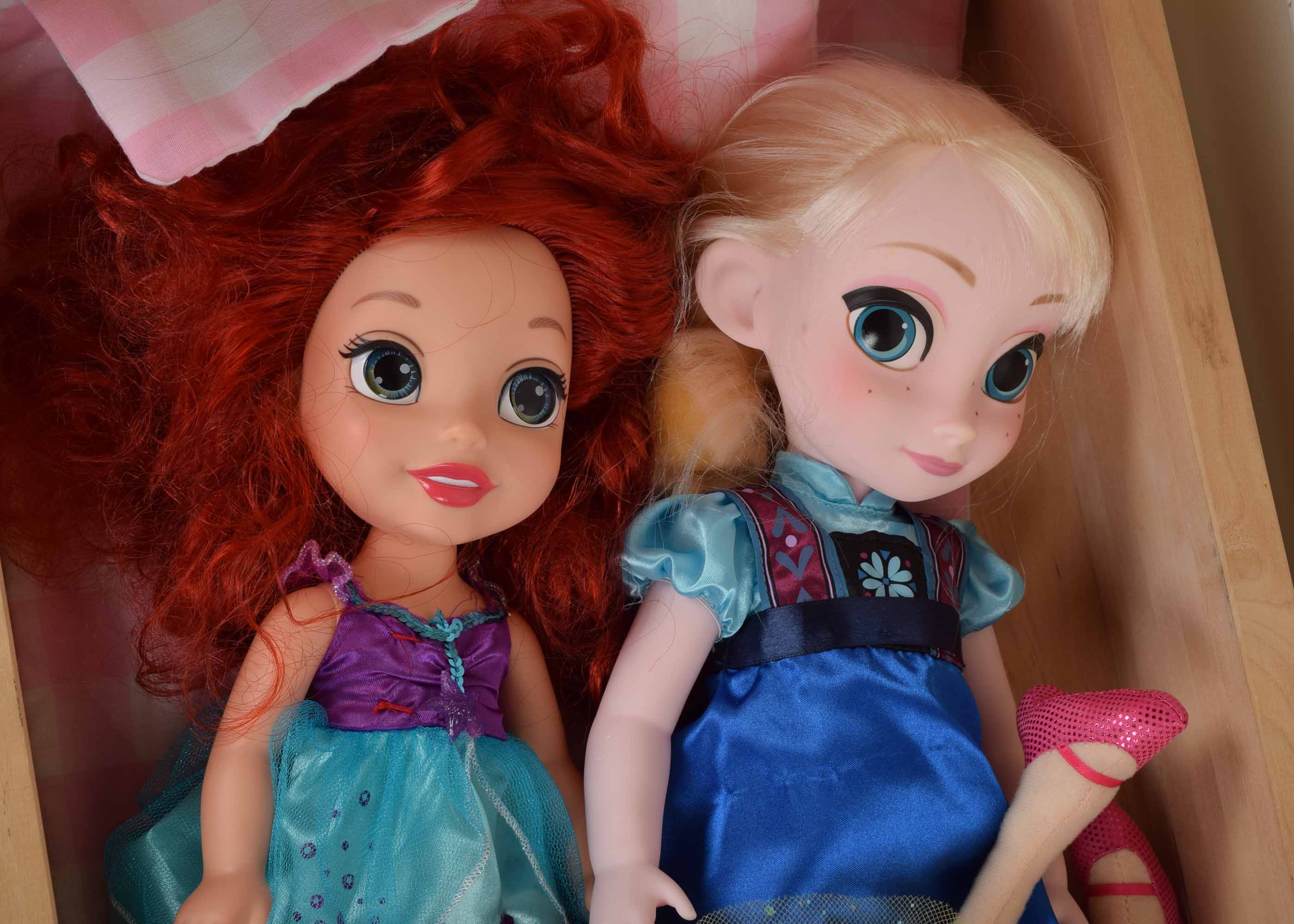 Wooden Doll Bed and Three Dolls