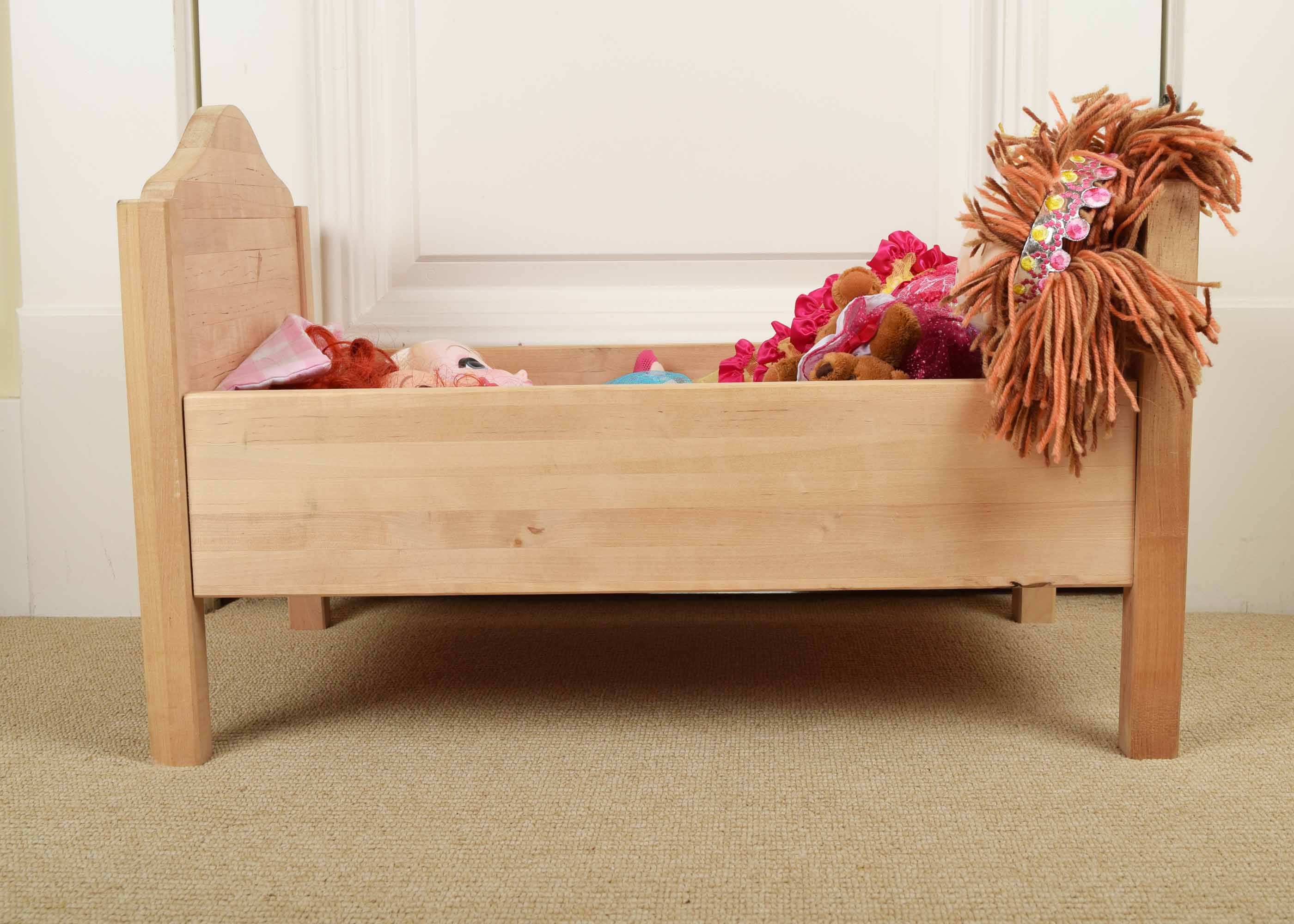 Wooden Doll Bed and Three Dolls