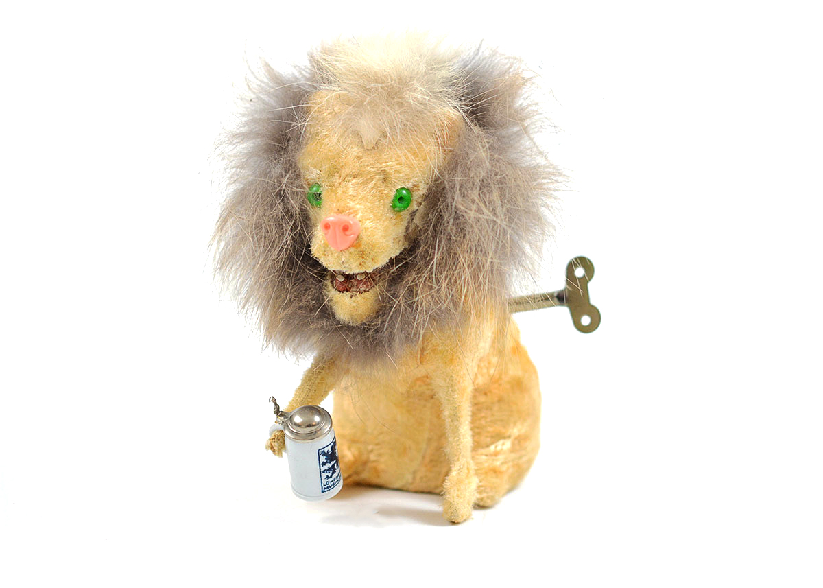 Vintage German Made EMO Brand Wind up Drinking Real Fur Lion