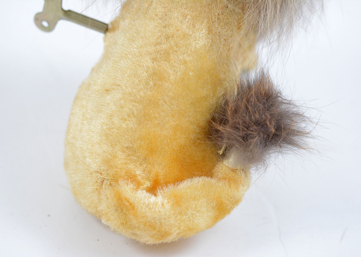 Vintage German Made EMO Brand Wind up Drinking Real Fur Lion