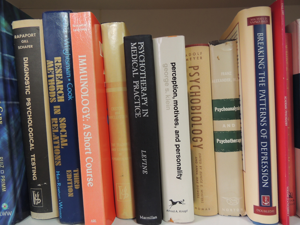 Bookcase Assortment of Psychology and Medical Books