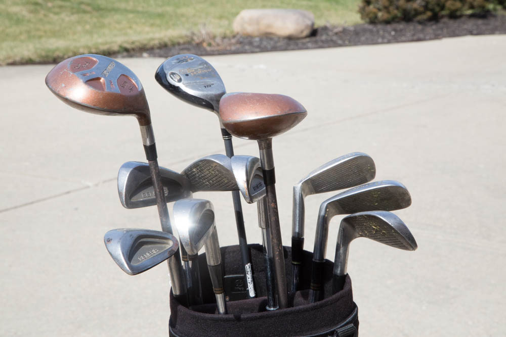 Collection of Golf Clubs with Rolling Caddy