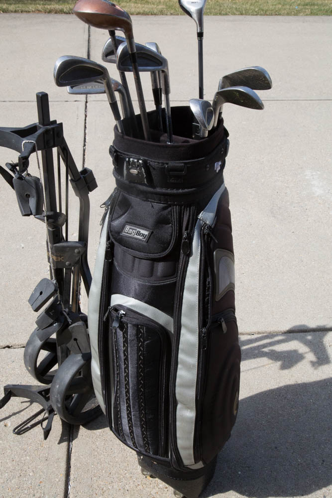 Collection of Golf Clubs with Rolling Caddy