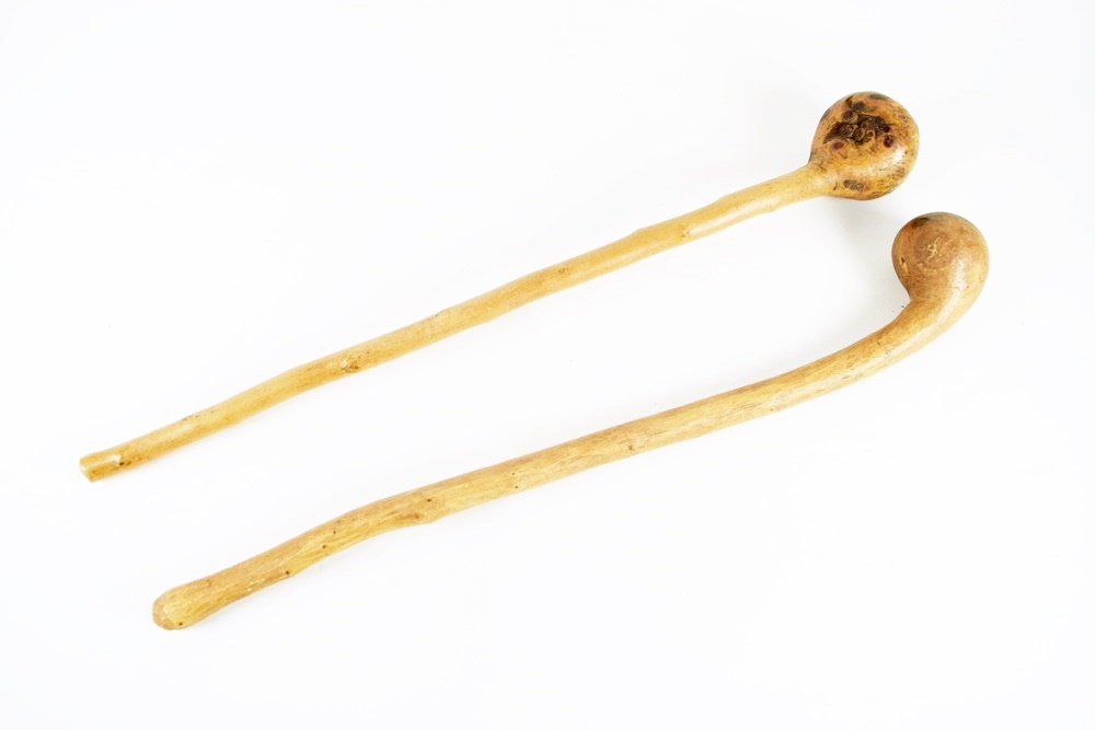 Two Primitive Wooden Clubs