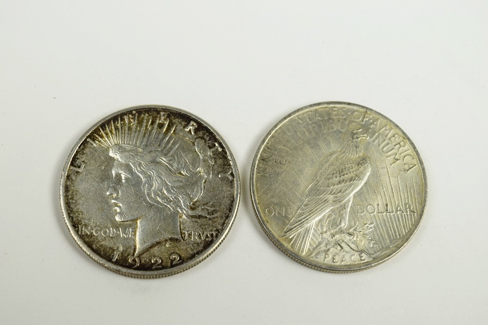 Twenty Seven US Peace Silver Dollars Dated 1922-1935