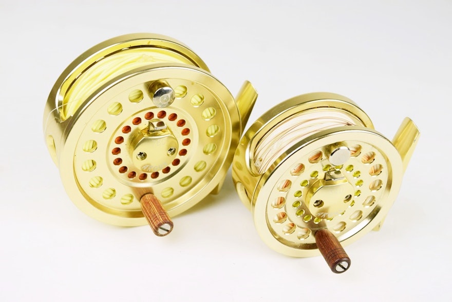 Two Gold Argus Reels with Line