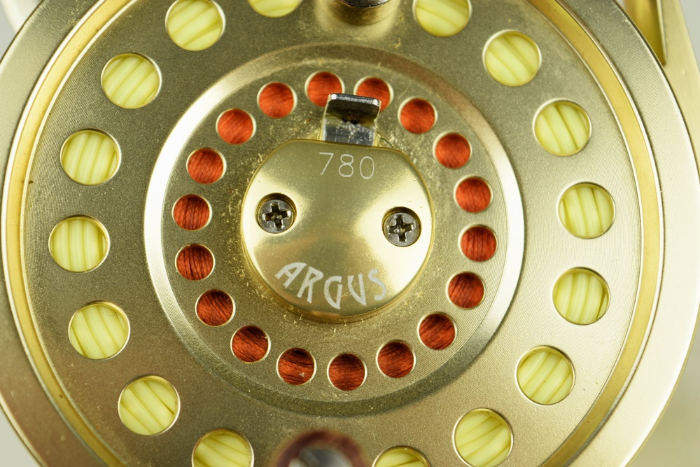 Two Gold Argus Reels with Line