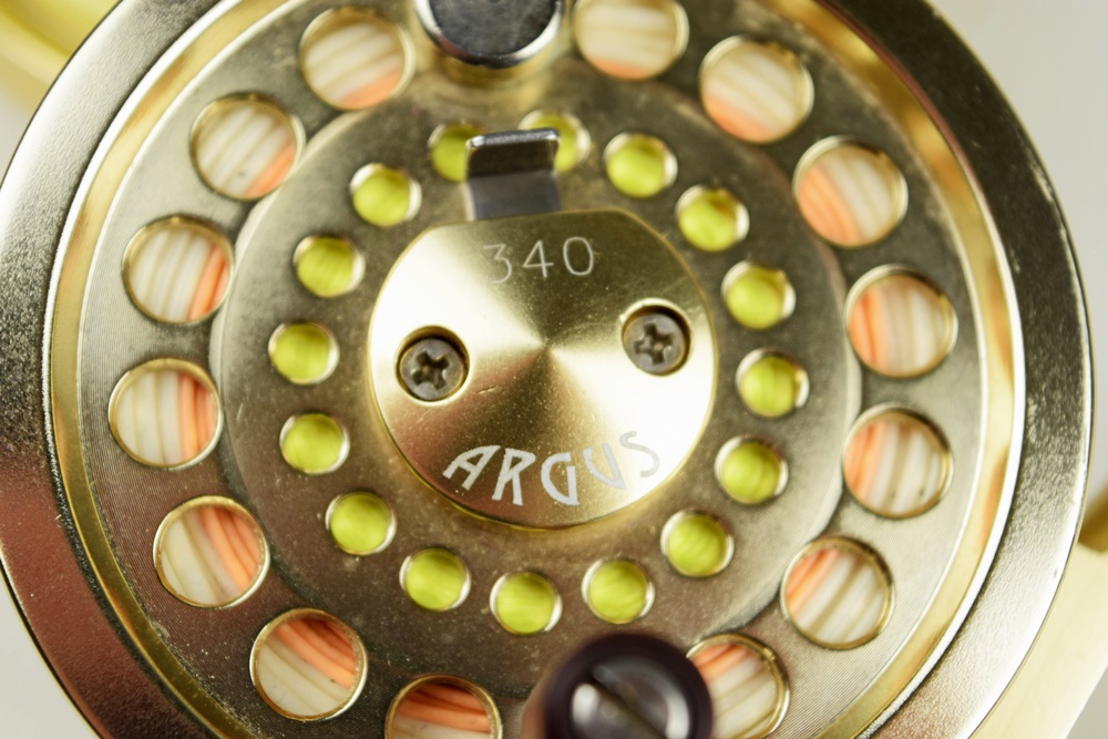 Two Gold Argus Reels with Line