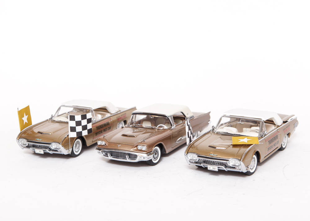 Collection of Gold Ford Thunderbird Model Cars