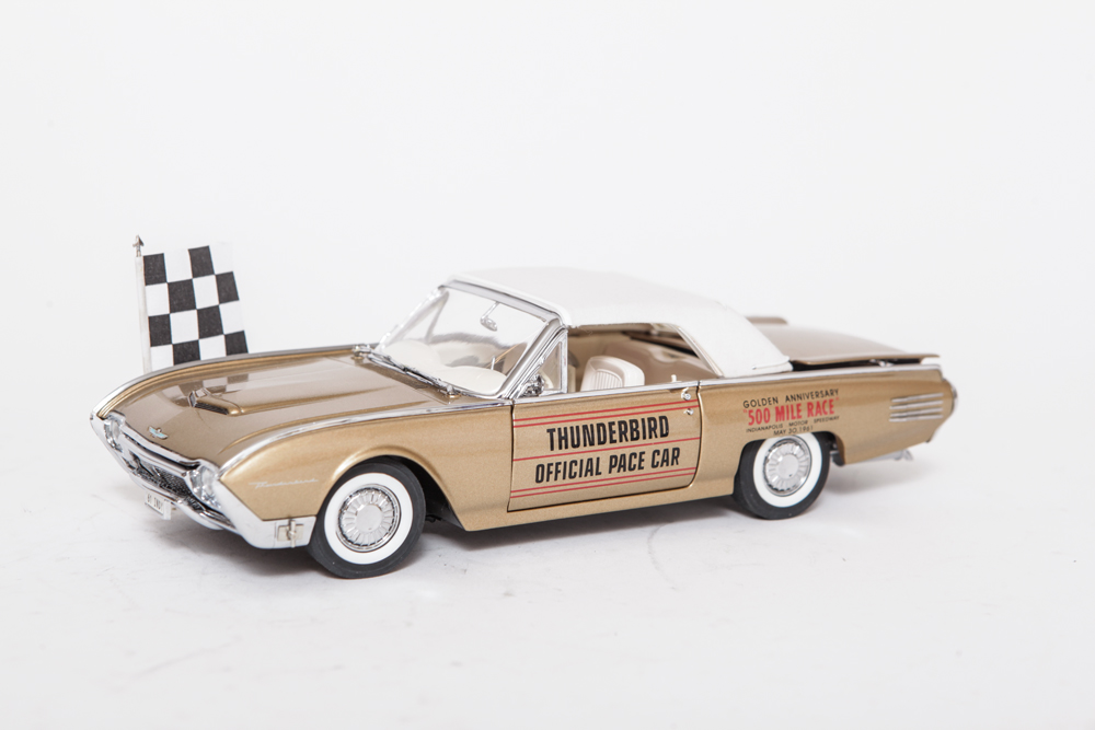 Collection of Gold Ford Thunderbird Model Cars