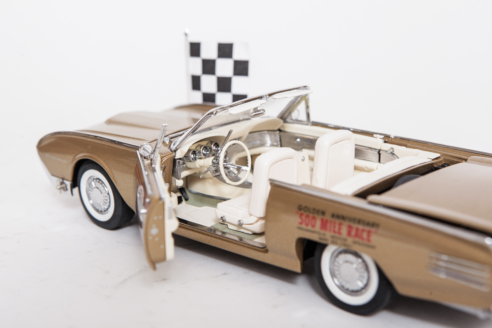 Collection of Gold Ford Thunderbird Model Cars