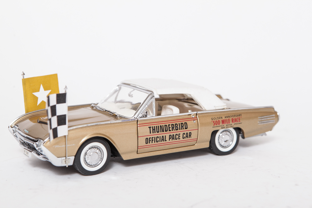Collection of Gold Ford Thunderbird Model Cars