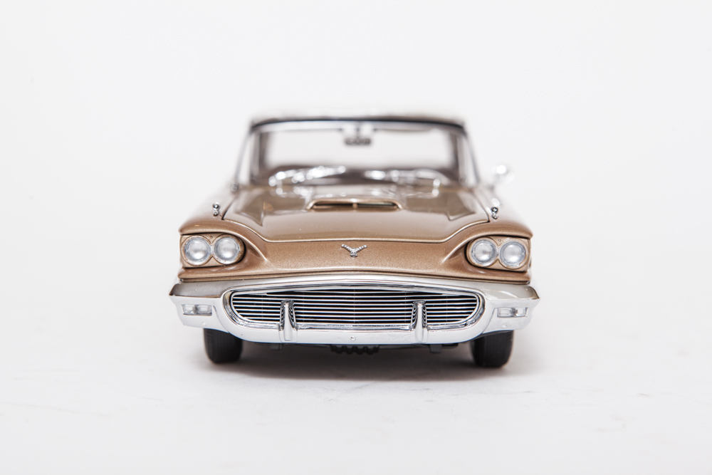 Collection of Gold Ford Thunderbird Model Cars