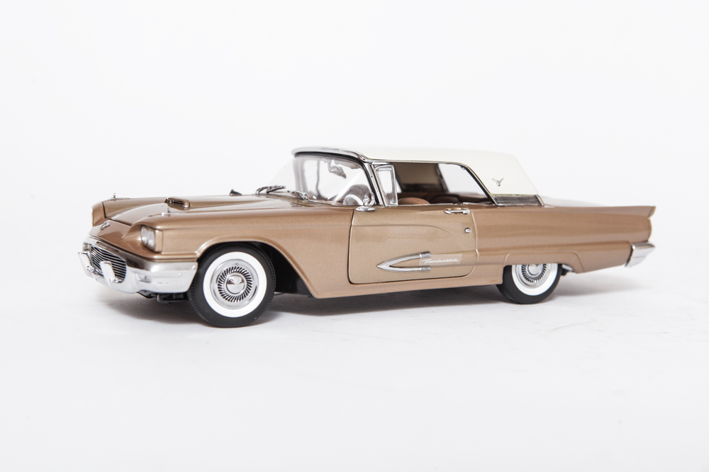 Collection of Gold Ford Thunderbird Model Cars