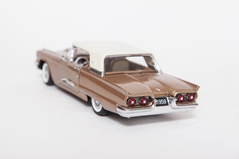Collection of Gold Ford Thunderbird Model Cars