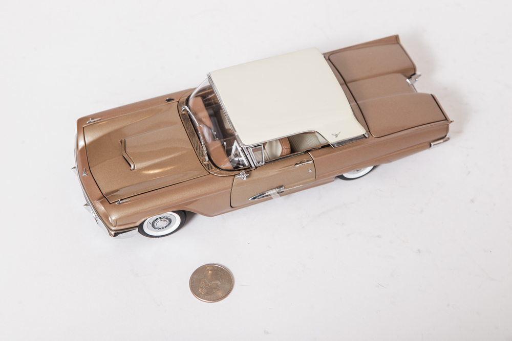 Collection of Gold Ford Thunderbird Model Cars